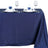 Elegant navy tablecloth set with plates and wine glasses for dining.