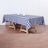 Blue and white checkered tablecloth on a wooden table.