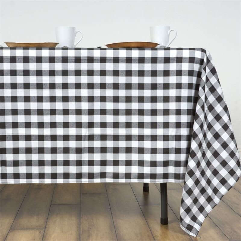 Black and white checkered tablecloth draped on a table.
