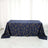 Navy tablecloth with geometric gold pattern on a plain table
