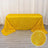 Yellow fringe table cover with a shiny texture
