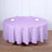 Purple round tablecloth with elegant table setting.