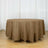 Brown round tablecloth draped over a table in a bright room.