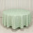 Green and white gingham tablecloth on a round table