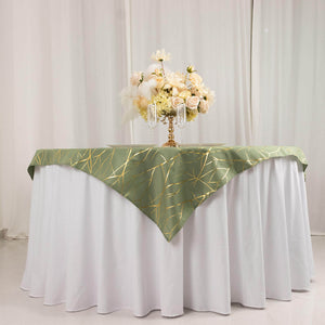 Elegant green tablecloth with gold accents draped over a white table.