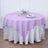 Round lavender tablecloth draped elegantly over a silver table cover.