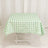 Green and white checkered tablecloth on a folding table