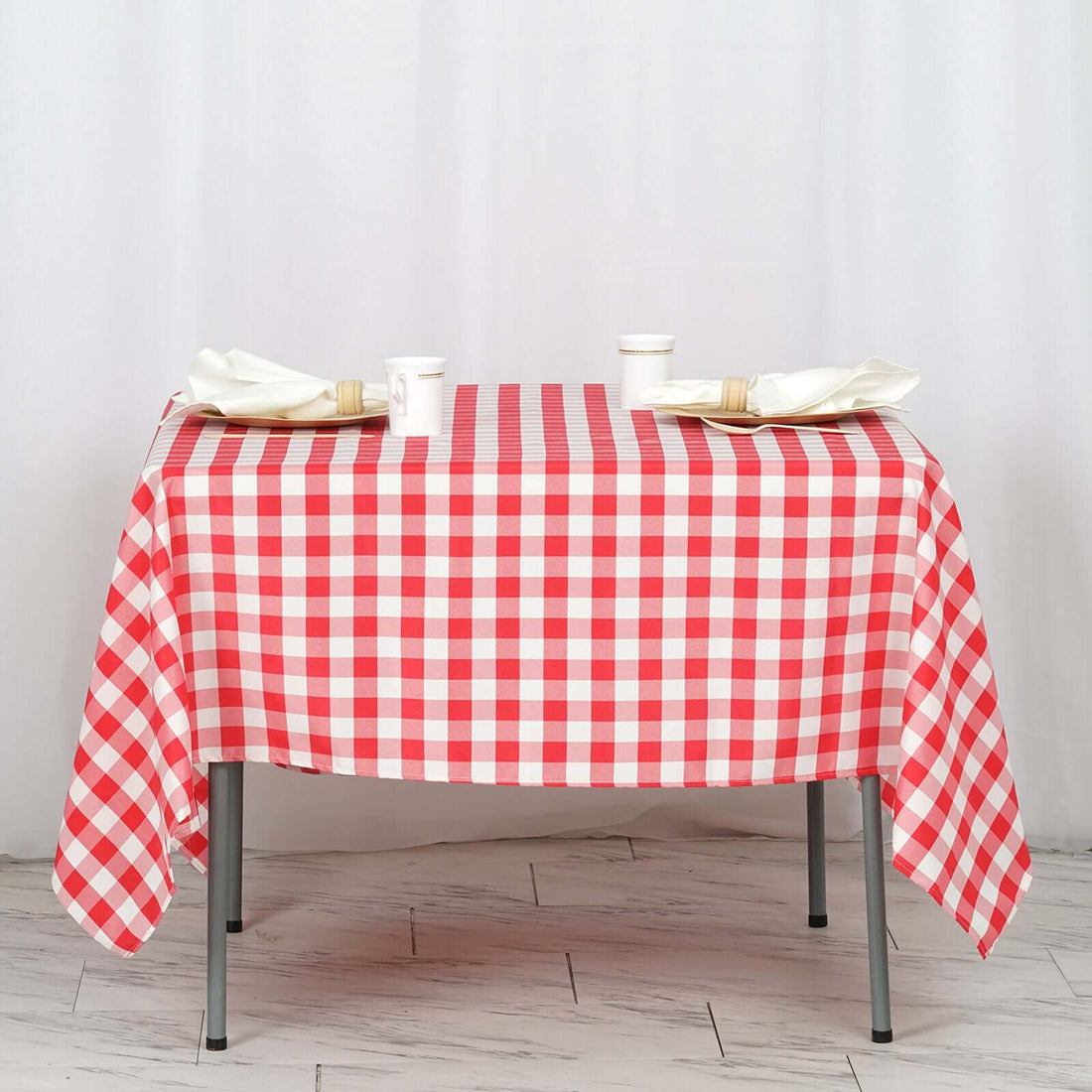 Red and white checkered tablecloth for Fourth of July party table