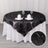 Black sheer table overlay with silver accents on a round table