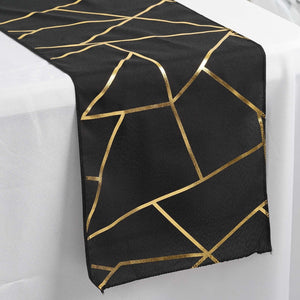 Black table runner with gold geometric pattern