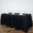 Elegant black tablecloth with dinnerware set for formal dining.