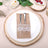 Elegant burlap cutlery holder with lace on a white plate