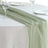 Elegant green table runner on a classic white table setting.