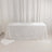 White textured tablecloth draped elegantly over a table
