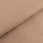 Textured beige fabric close-up showcasing soft, ribbed design.