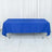 Blue tablecloth draped over a table in a studio setting.