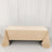 Beige tablecloth on a table against a plain backdrop.