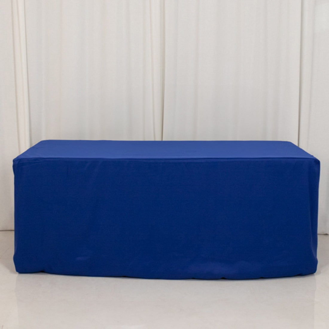 Blue table cover on a plain backdrop for events and displays.