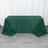 Green tablecloth draped on a table in a studio setting.