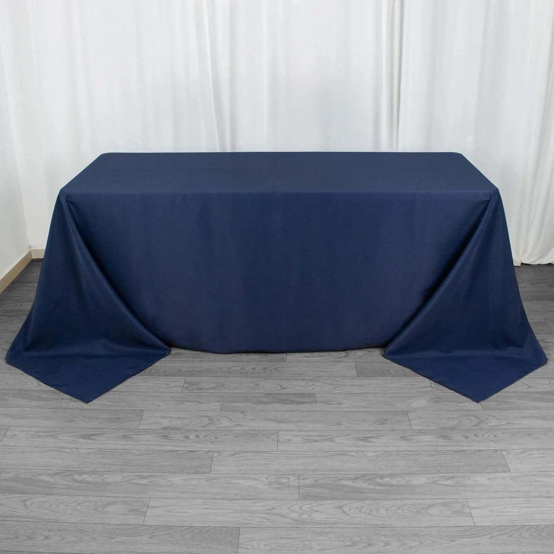 Navy blue tablecloth draped over a table