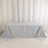 Gray tablecloth draped on a table against a plain background.