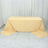 Beige tablecloth draped over a table with a plain background.