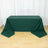 Green tablecloth draped over a rectangular table on a wooden floor.
