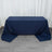 Navy blue tablecloth draped over a table in a studio setting.