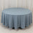 Round blue tablecloth with elegant drape on a plain backdrop.
