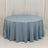 Blue round tablecloth with draped edges on a plain backdrop.
