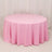 Round pink tablecloth draping elegantly over a table surface.