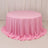 Round pink tablecloth with elegant draping.