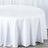 Round white tablecloth draped elegantly over a table