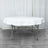 White oval table with a fitted tablecloth on a plain background