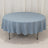 Round blue tablecloth on a table against a plain background.