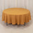 Round mustard yellow tablecloth on a circular table.