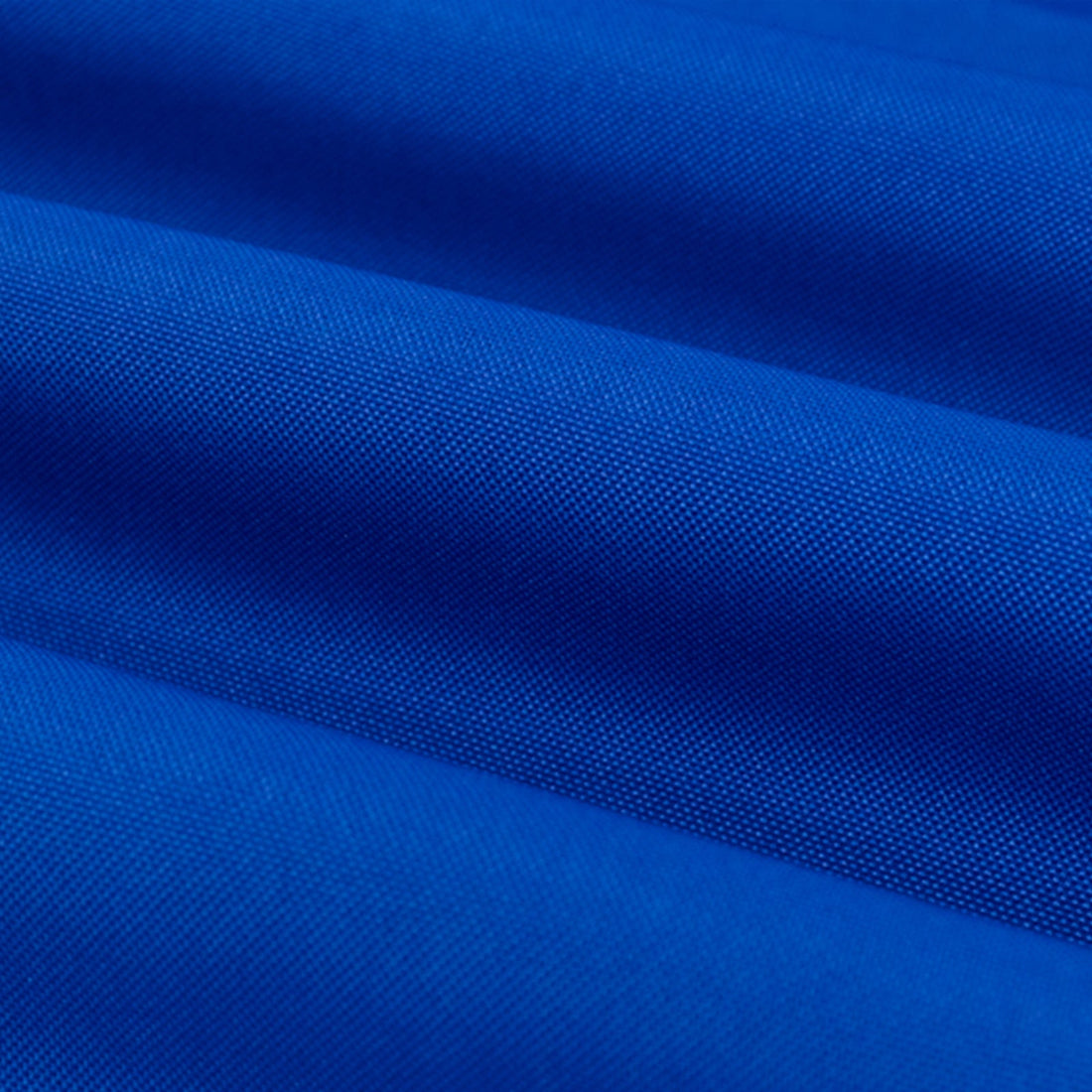 Close-up of vibrant blue fabric texture.