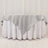 Gray tablecloth layered over a white table for elegant event styling.