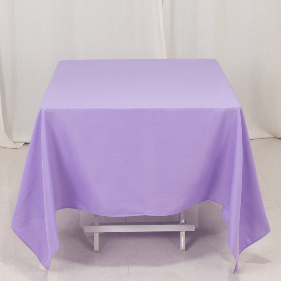 Purple tablecloth on a table, showcasing a smooth, vibrant fabric.