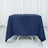 Navy tablecloth draped over a table in a studio setting