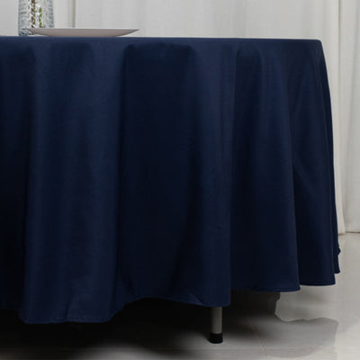 Navy tablecloth draped elegantly over a table edge