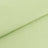 Light green textured fabric close-up for sewing and crafting projects.