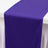 Purple table runner on a white tablecloth