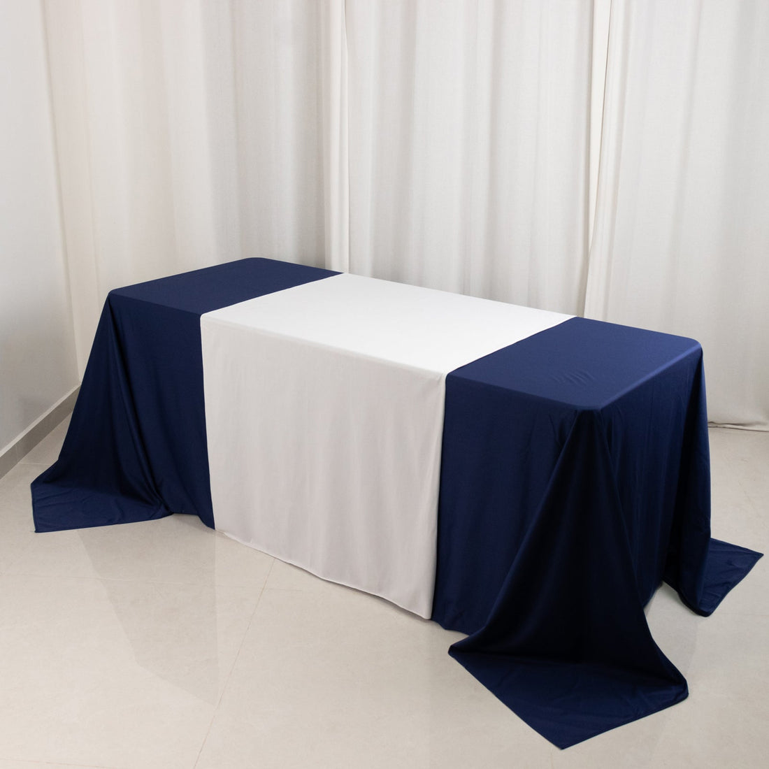 Navy and white tablecloth draped over a table