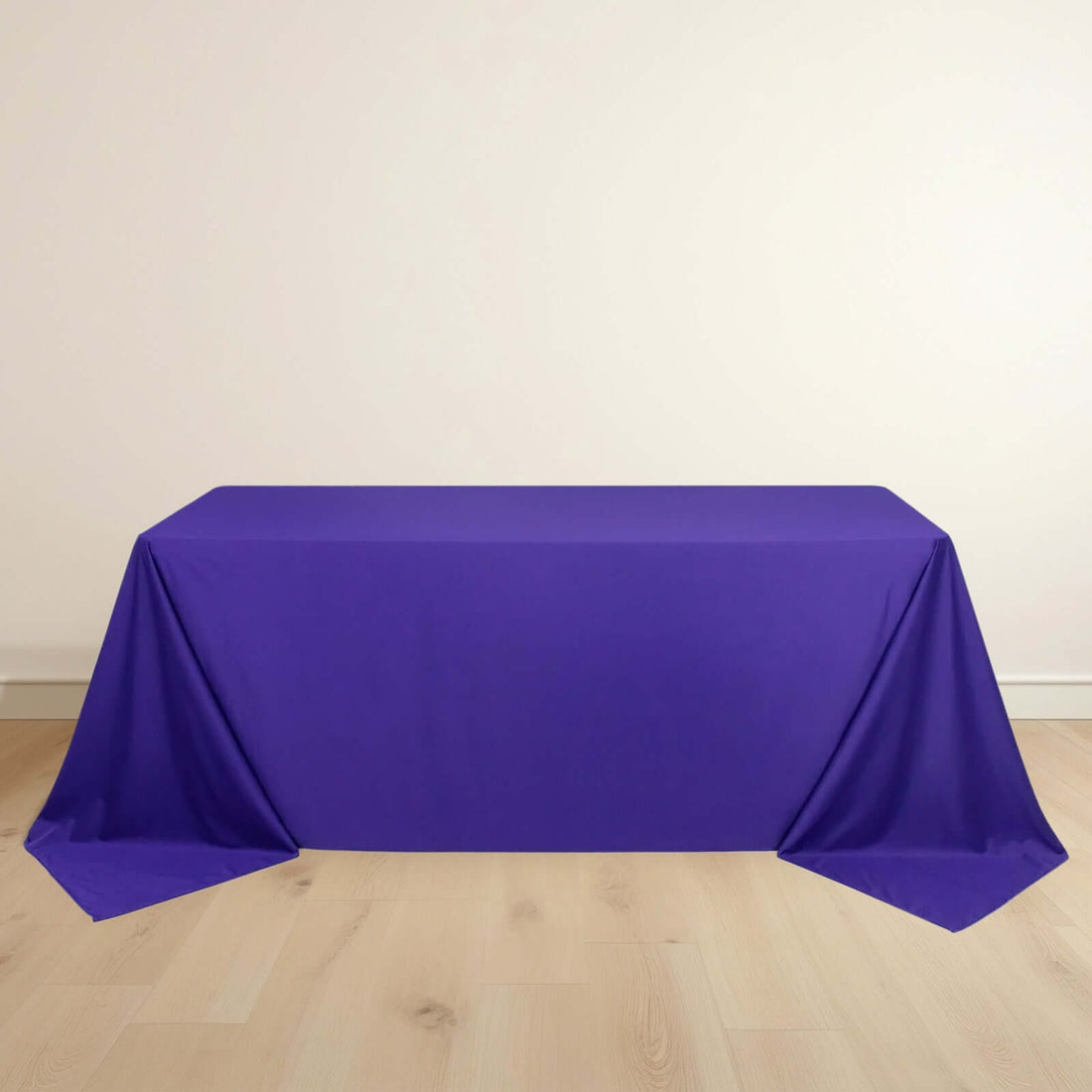 Purple tablecloth draped elegantly over a table