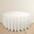 Round white tablecloth draped elegantly over a table.