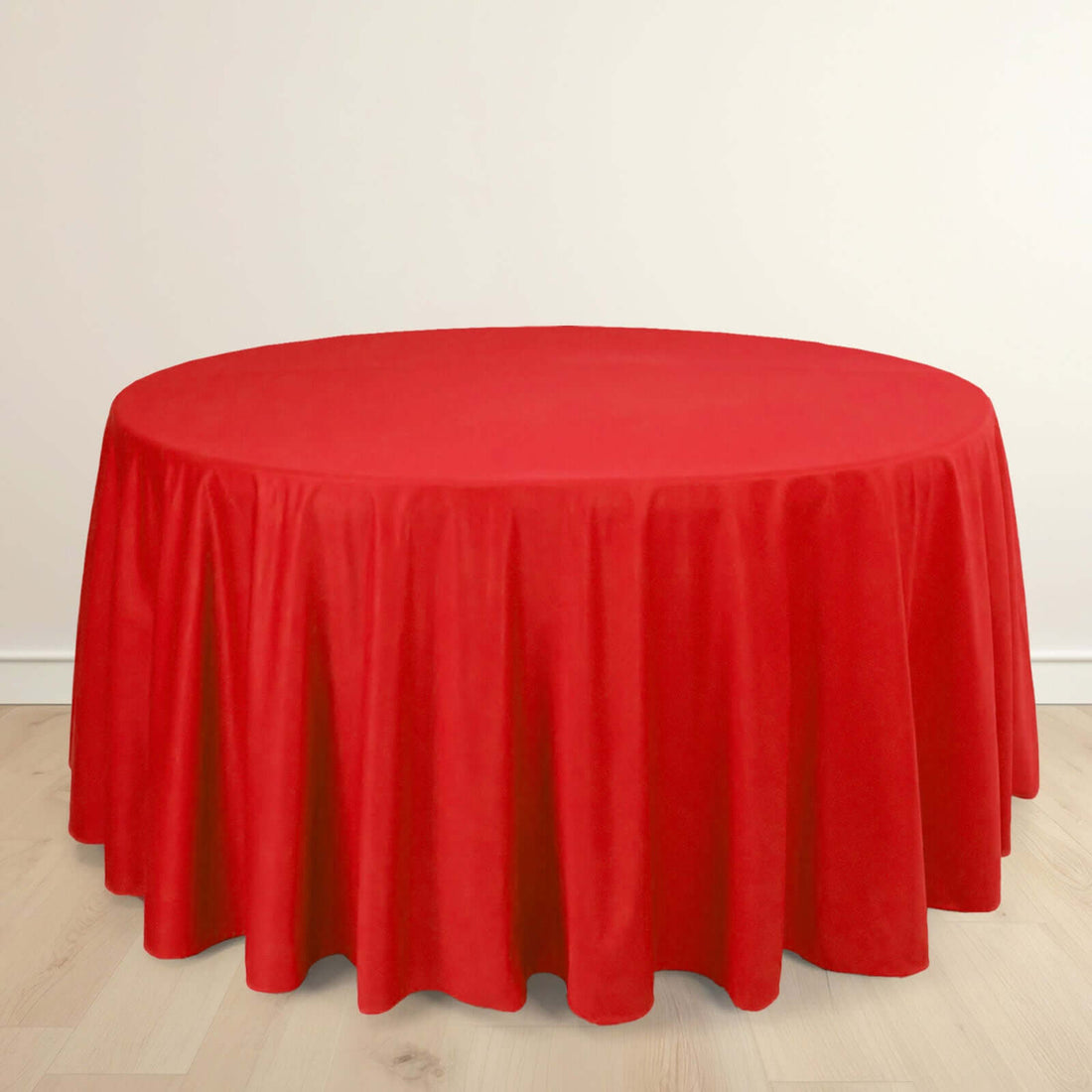 Red round tablecloth draped elegantly on a table