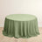 Round green tablecloth draped on a table.