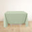 Green tablecloth draped over a table in a minimalist setting.