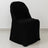 Black chair cover on a plain backdrop